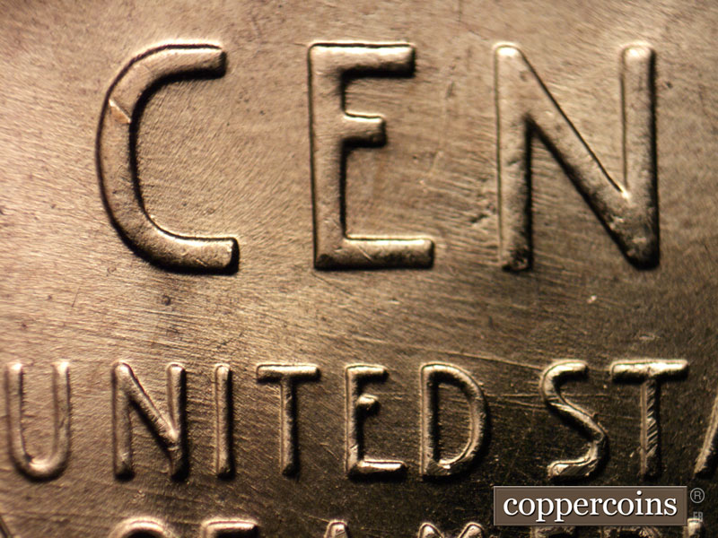 Die-stage B marker on 1957D•1MM•071 (1957 Repunched Mint Mark).