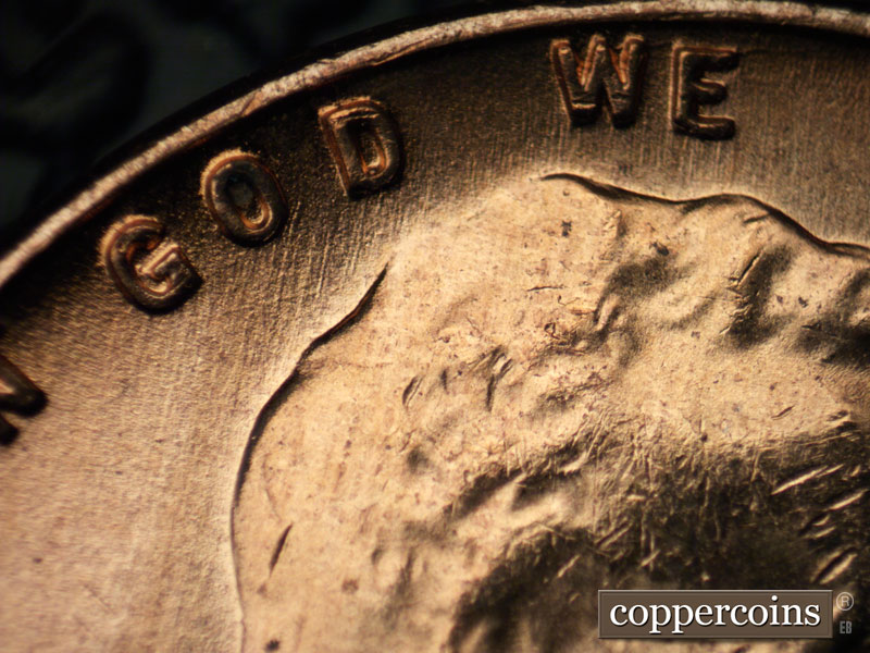 Die-stage B marker on 1957D•1MM•074 (1957 Repunched Mint Mark).