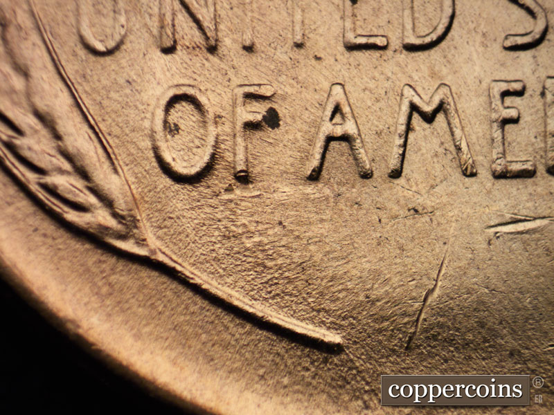Die-stage B marker on 1957D•1MM•074 (1957 Repunched Mint Mark).