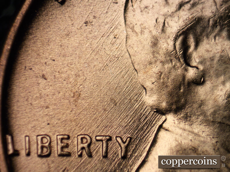 Die-stage B marker on 1957D•1MM•075 (1957 Repunched Mint Mark).