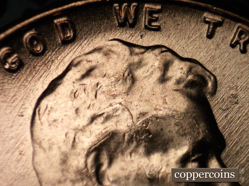 Die-stage B marker on 1957D•1MM•075 (1957 Repunched Mint Mark).