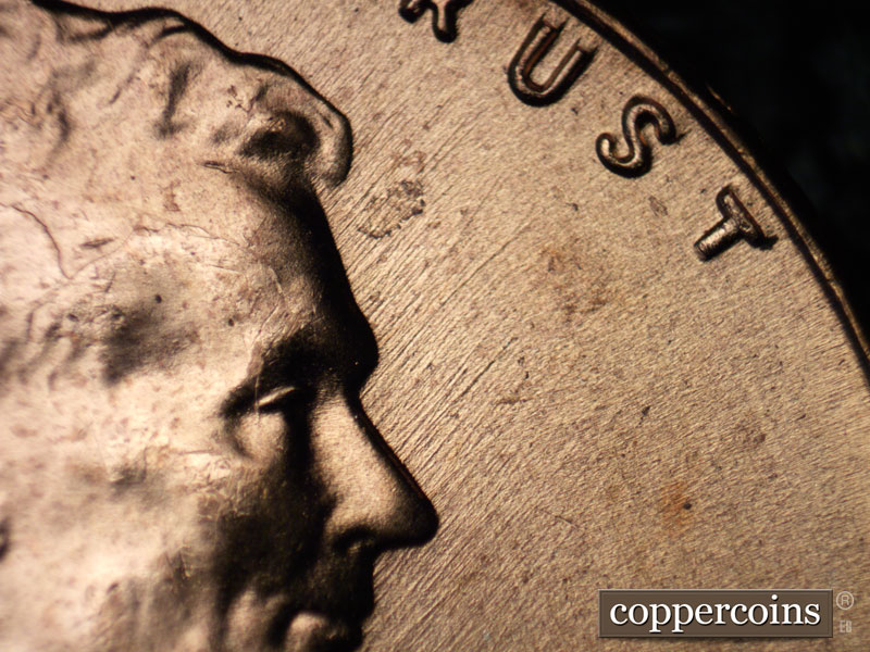 Die-stage B marker on 1957D•1MM•075 (1957 Repunched Mint Mark).