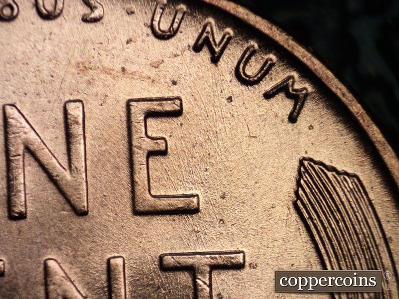Die-stage B marker on 1957D•1MM•075 (1957 Repunched Mint Mark).