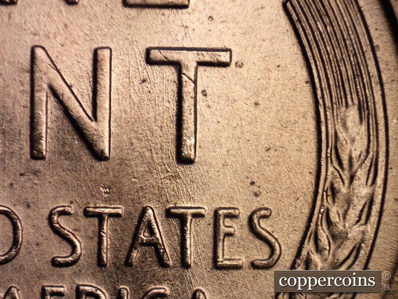 Die-stage B marker on 1957D•1MM•075 (1957 Repunched Mint Mark).