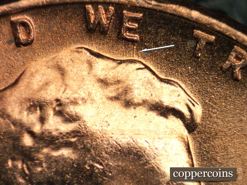 Die-stage B marker on 1957D•1MM•076 (1957 Repunched Mint Mark).