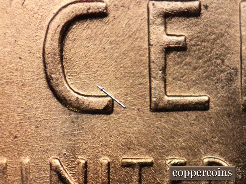Die-stage B marker on 1957D•1MM•076 (1957 Repunched Mint Mark).