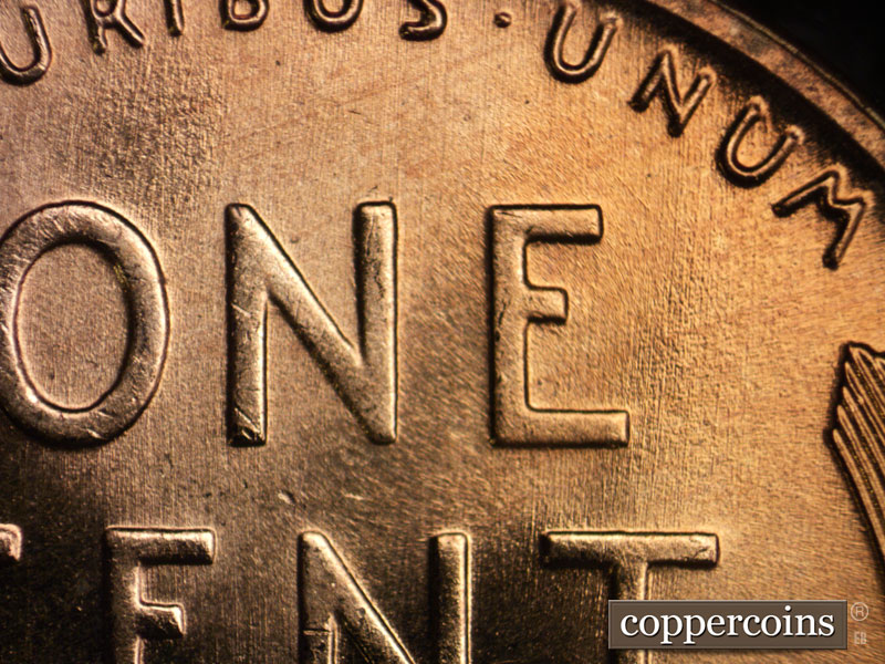 Die-stage B marker on 1957D•1MM•077 (1957 Repunched Mint Mark).
