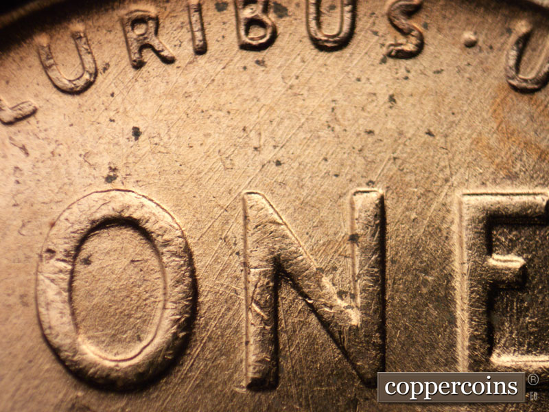Die-stage B marker on 1957D•1MM•080 (1957 Repunched Mint Mark).