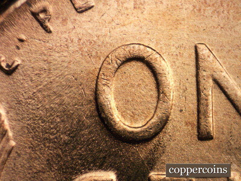 Die-stage C marker on 1957D•1MM•081 (1957 Repunched Mint Mark).