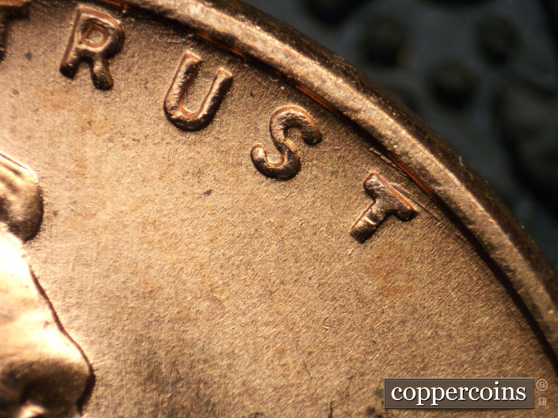 Die-stage B marker on 1957D•1MM•082 (1957 Repunched Mint Mark).