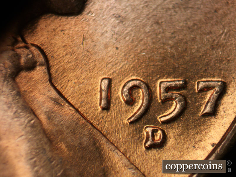 Die-stage B marker on 1957D•1MM•083 (1957 Repunched Mint Mark).
