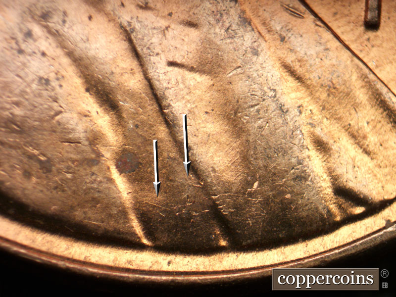 Die-stage B marker on 1957D•1MM•083 (1957 Repunched Mint Mark).