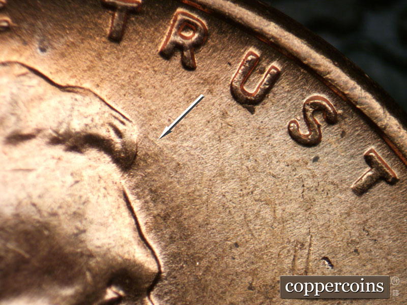 Die-stage B marker on 1957D•1MM•083 (1957 Repunched Mint Mark).