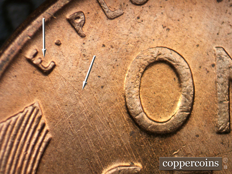 Die-stage B marker on 1957D•1MM•083 (1957 Repunched Mint Mark).