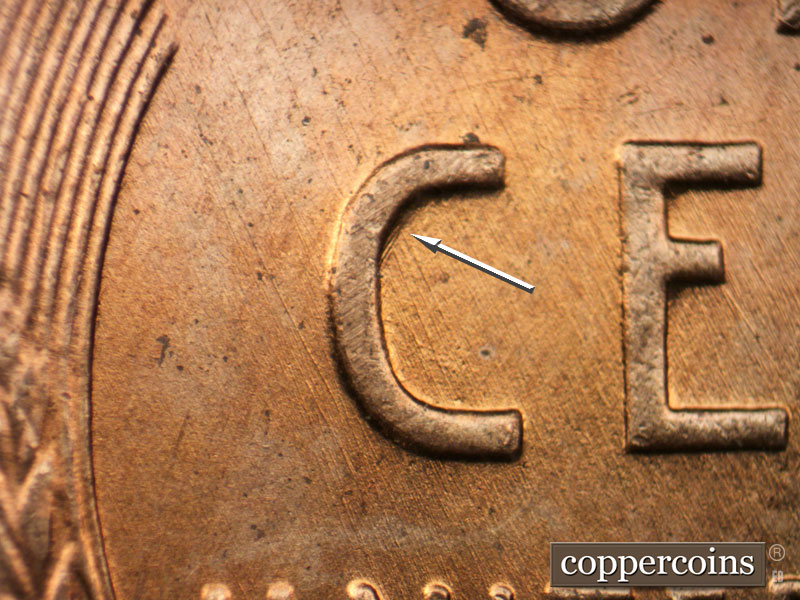 Die-stage B marker on 1957D•1MM•083 (1957 Repunched Mint Mark).