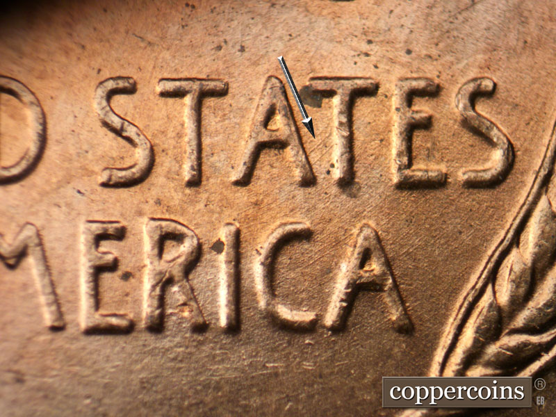 Die-stage B marker on 1957D•1MM•083 (1957 Repunched Mint Mark).