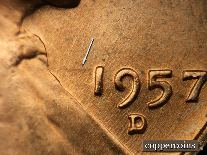 Die-stage B marker on 1957D•1MM•086 (1957 Repunched Mint Mark).