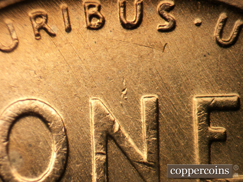 Die-stage B marker on 1957D•1MM•086 (1957 Repunched Mint Mark).