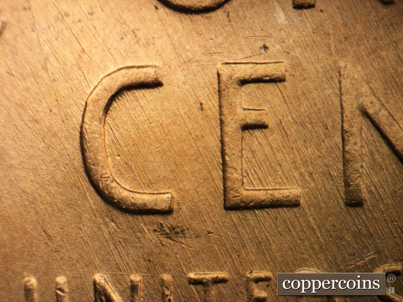 Die-stage B marker on 1957D•1MM•086 (1957 Repunched Mint Mark).