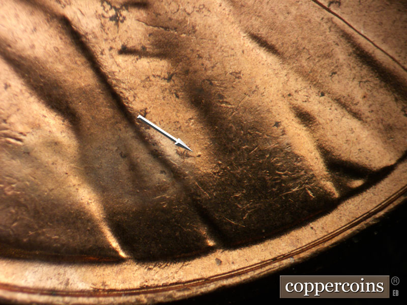 Die-stage A marker on 1957D•1MM•087 (1957 Repunched Mint Mark).