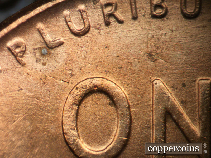 Die-stage A marker on 1957D•1MM•087 (1957 Repunched Mint Mark).