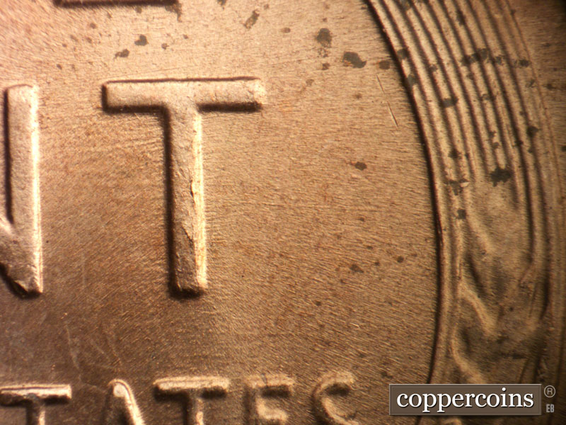 Die-stage A marker on 1957D•1MM•087 (1957 Repunched Mint Mark).