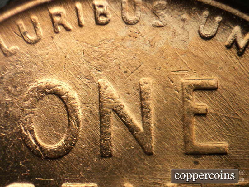 Die-stage B marker on 1957D•1MM•087 (1957 Repunched Mint Mark).