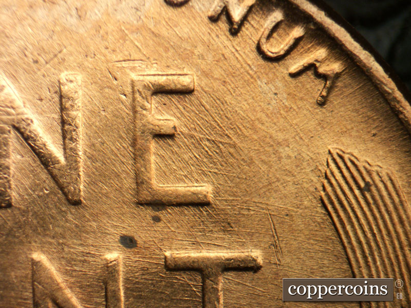Die-stage B marker on 1957D•1MM•087 (1957 Repunched Mint Mark).