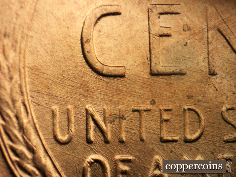 Die-stage B marker on 1957D•1MM•087 (1957 Repunched Mint Mark).