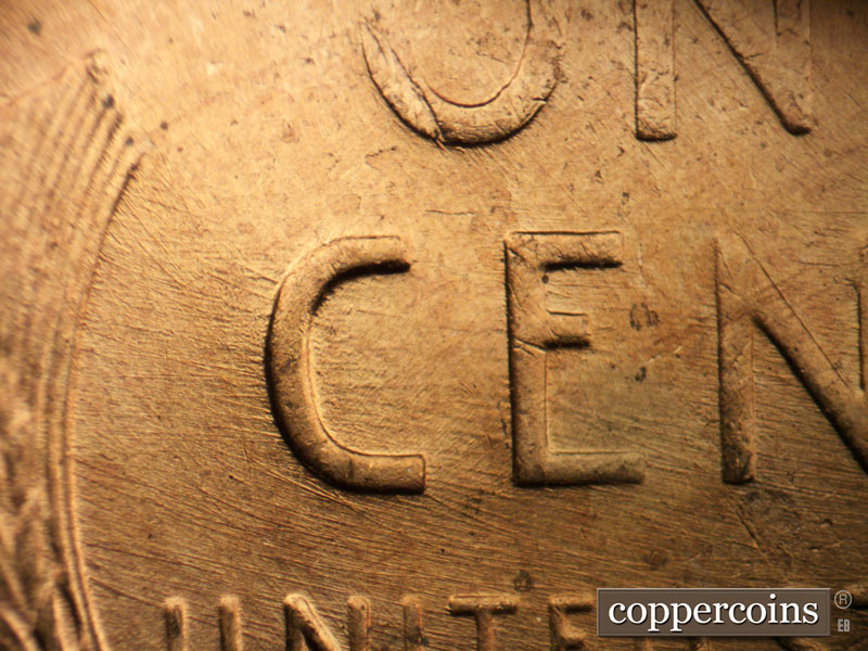 Die-stage B marker on 1957D•1MM•087 (1957 Repunched Mint Mark).