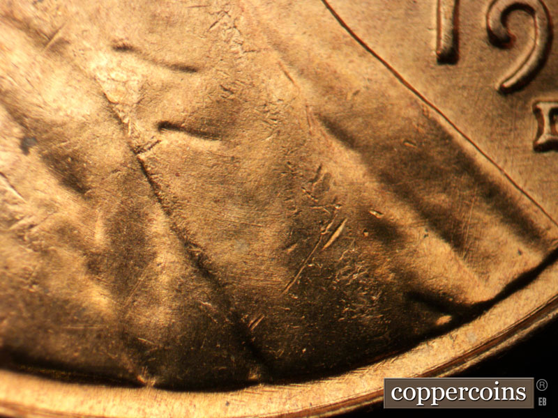 Die-stage B marker on 1957D•1MM•088 (1957 Repunched Mint Mark).