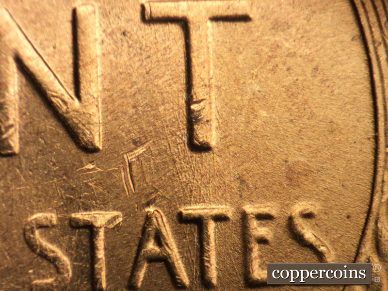 Die-stage B marker on 1957D•1MM•088 (1957 Repunched Mint Mark).