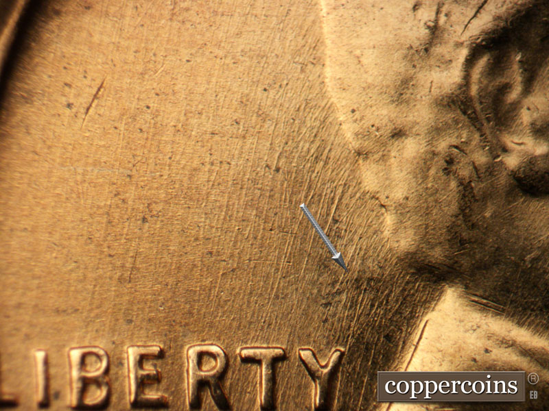 Die-stage B marker on 1957D•1MM•089 (1957 Repunched Mint Mark).