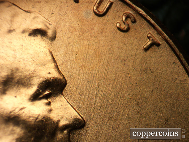 Die-stage B marker on 1957D•1MM•089 (1957 Repunched Mint Mark).