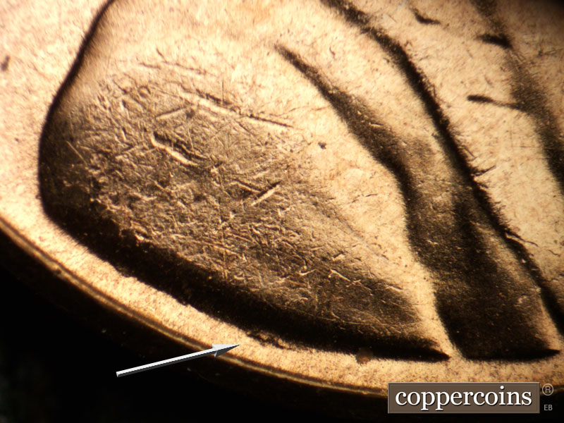 Die-stage C marker on 1957D•1MM•091 (1957 Repunched Mint Mark).