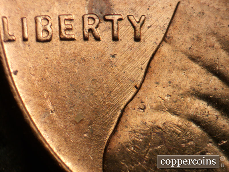 Die-stage B marker on 1957D•1MM•092 (1957 Repunched Mint Mark).