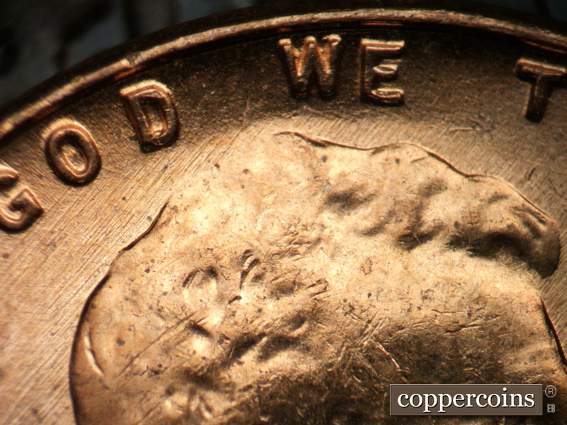 Die-stage B marker on 1957D•1MM•092 (1957 Repunched Mint Mark).
