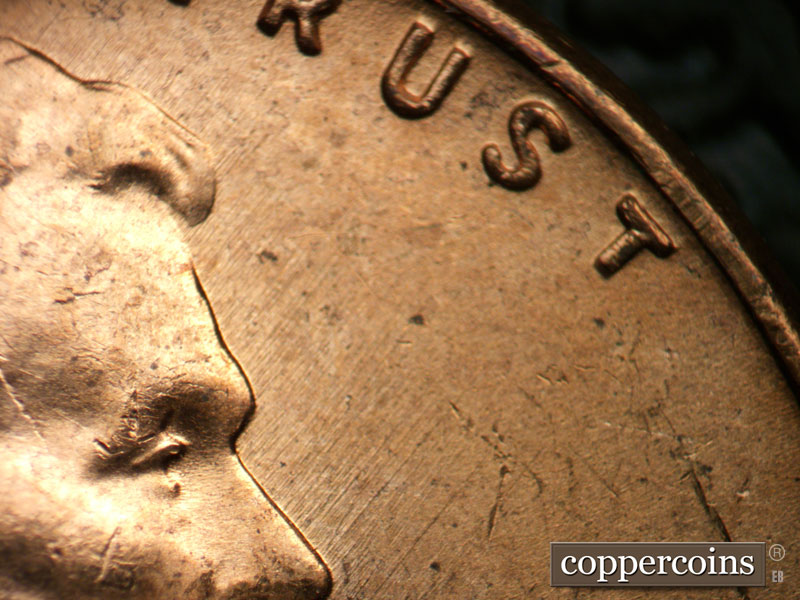 Die-stage B marker on 1957D•1MM•092 (1957 Repunched Mint Mark).