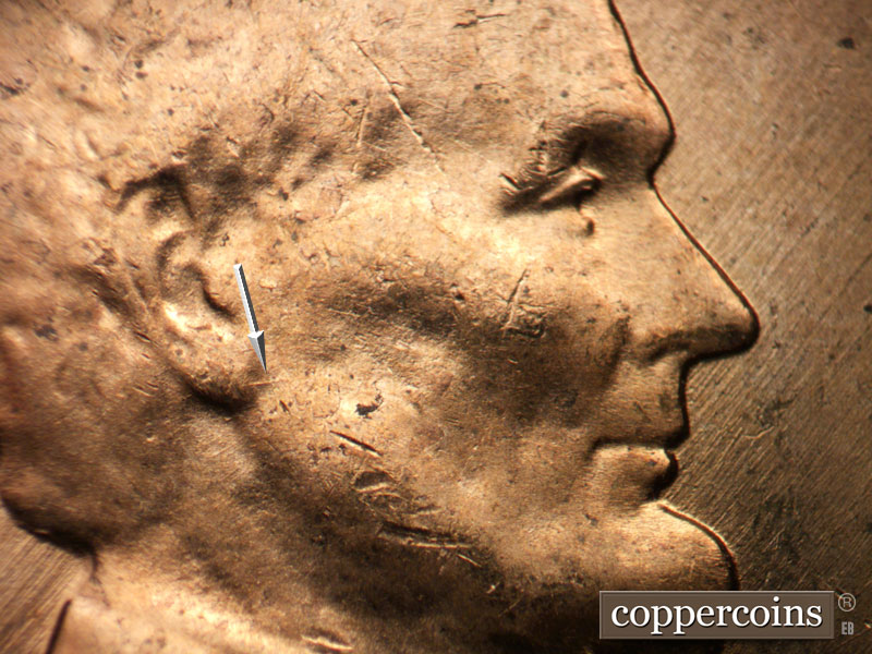 Die-stage B marker on 1957D•1MM•092 (1957 Repunched Mint Mark).