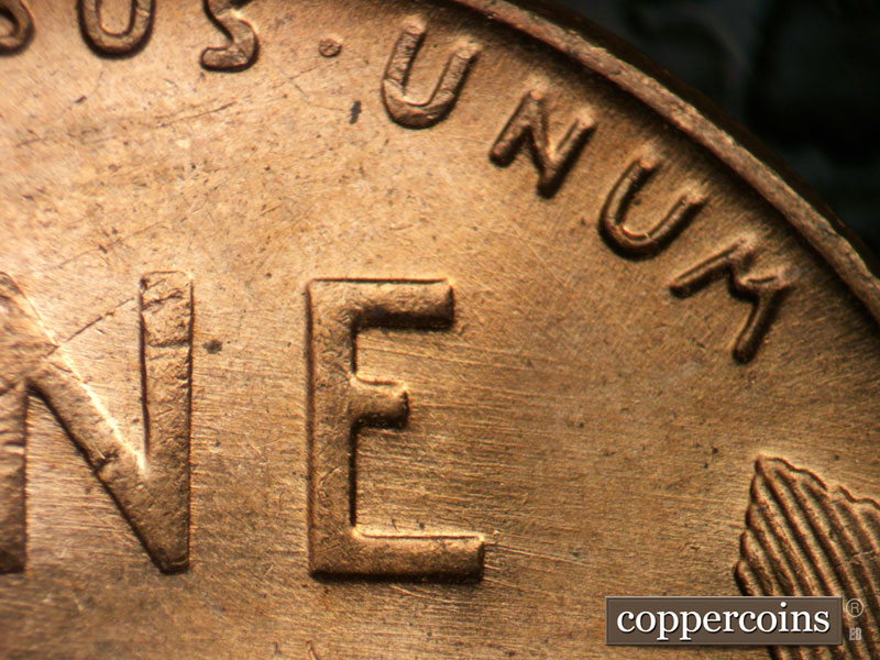 Die-stage B marker on 1957D•1MM•092 (1957 Repunched Mint Mark).