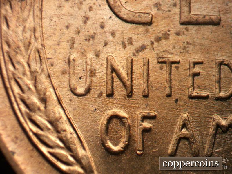 Die-stage B marker on 1957D•1MM•092 (1957 Repunched Mint Mark).