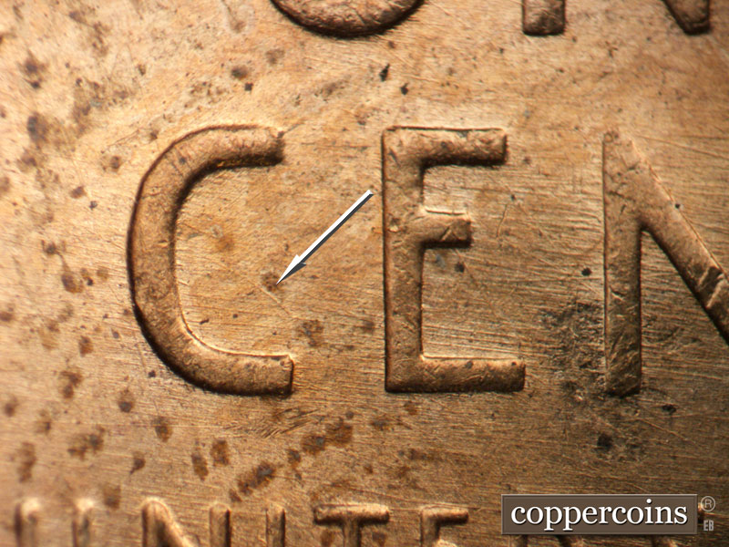 Die-stage B marker on 1957D•1MM•092 (1957 Repunched Mint Mark).