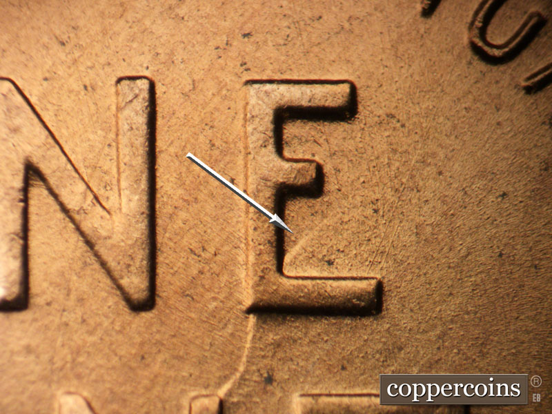 Die-stage B marker on 1957D•1MM•093 showing Die clash through E in ONE to N in CENT.
