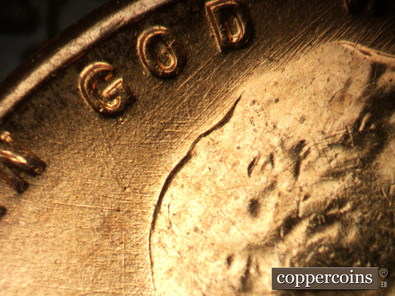 Die-stage B marker on 1957D•1MM•094 (1957 Repunched Mint Mark).