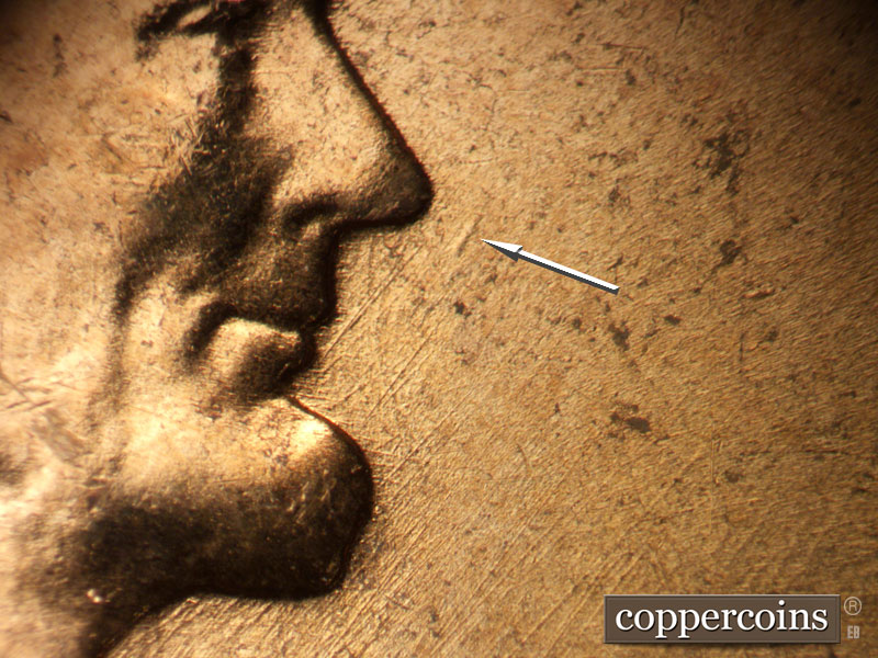 Die-stage B marker on 1957D•1MM•094 (1957 Repunched Mint Mark).