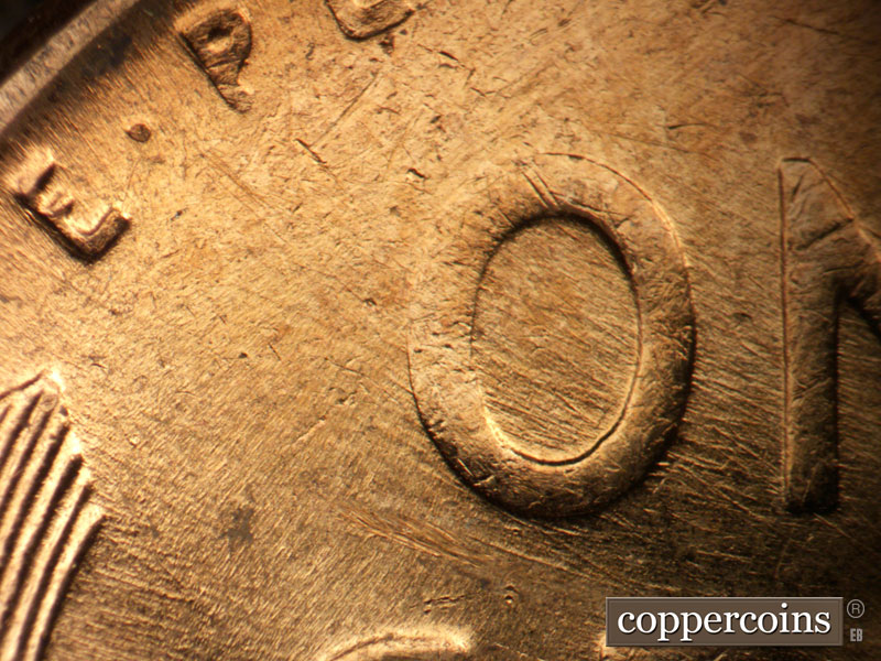 Die-stage B marker on 1957D•1MM•094 (1957 Repunched Mint Mark).