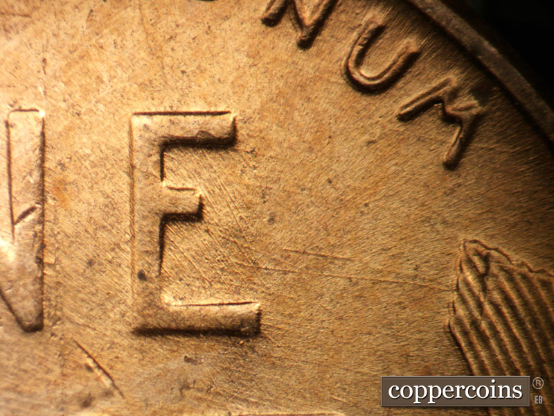 Die-stage B marker on 1957D•1MM•094 (1957 Repunched Mint Mark).