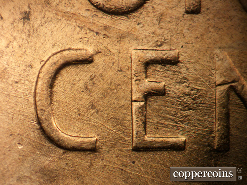 Die-stage B marker on 1957D•1MM•094 (1957 Repunched Mint Mark).