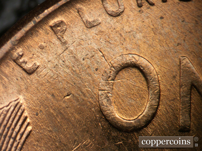 Die-stage B marker on 1957D•1MM•096 (1957 Repunched Mint Mark).
