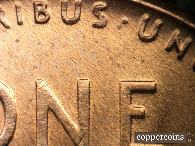 Die-stage B marker on 1957D•1MM•096 (1957 Repunched Mint Mark).